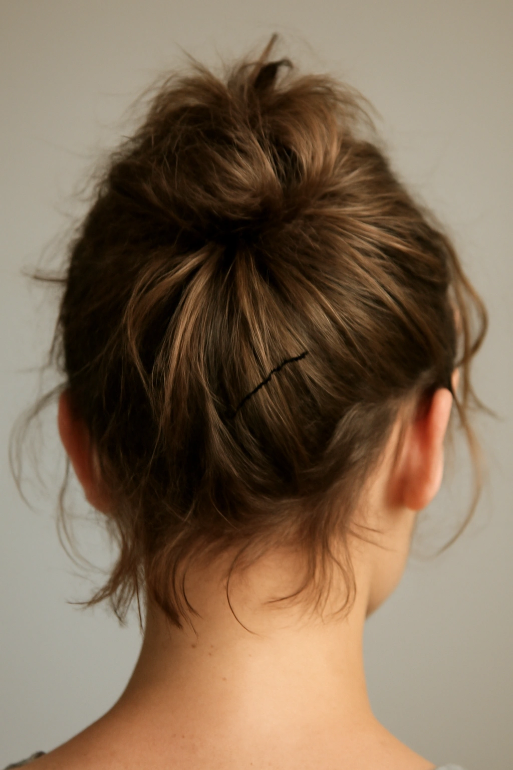 Short-haired bun slipping out due to insufficient grip and texture