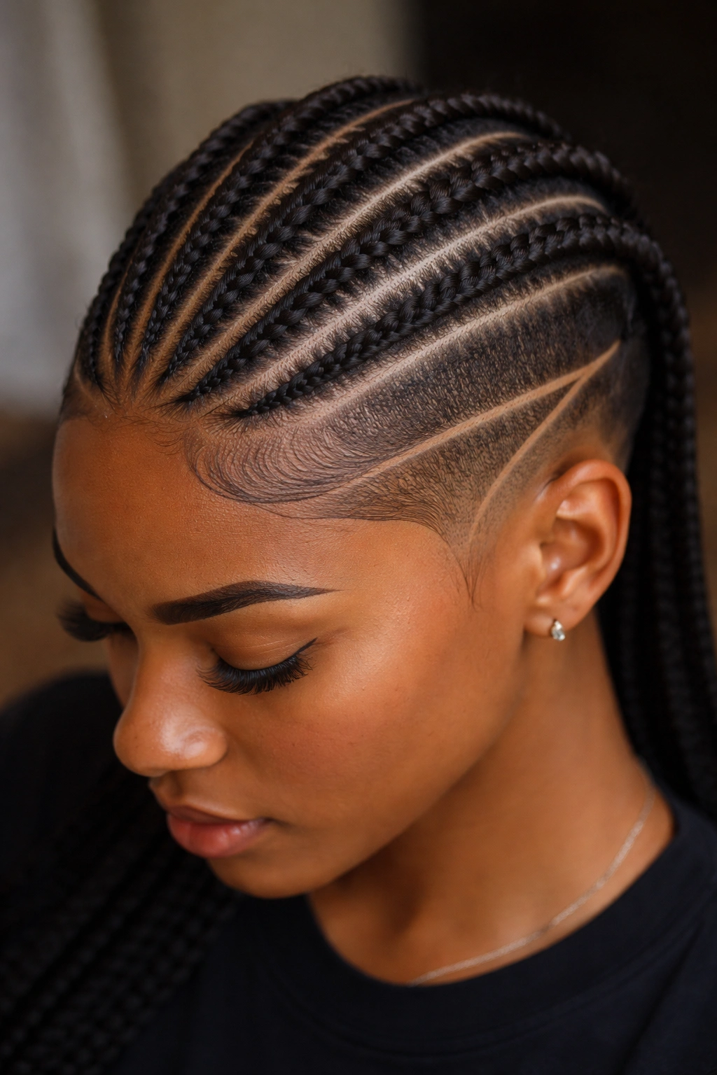 Cornrow pattern with fade and design line on undercut