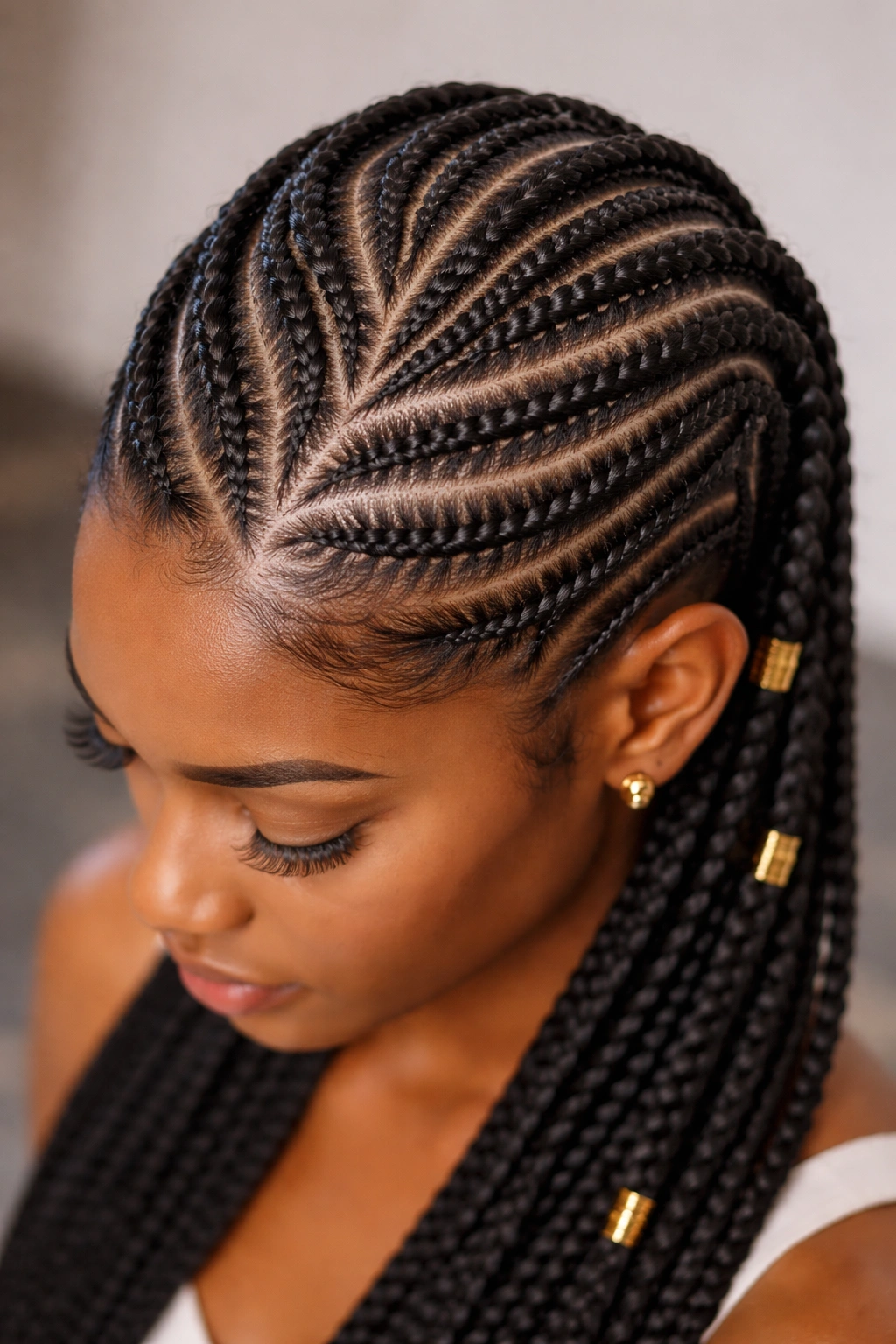 Close-up of raised cornrows in geometric pattern