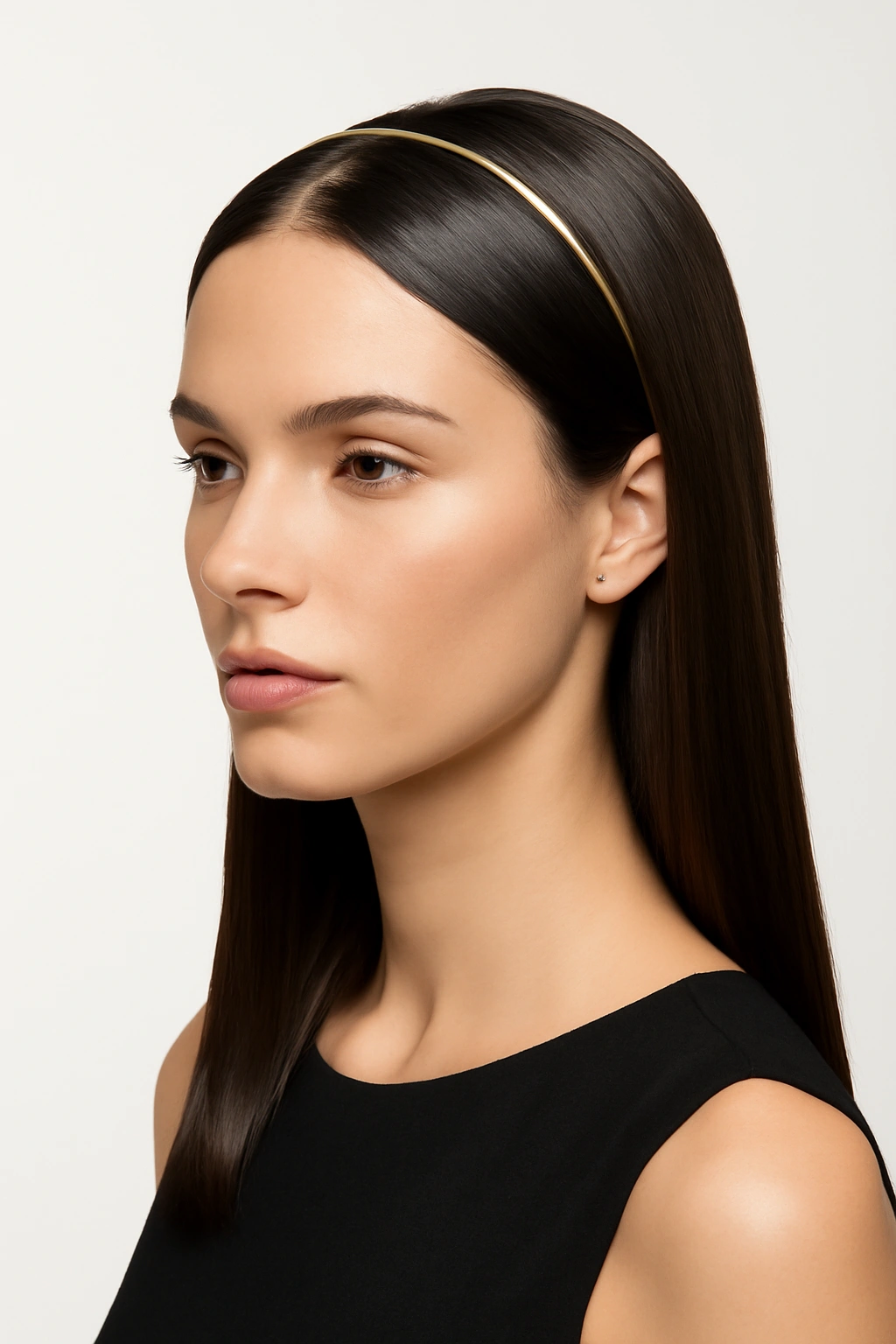 Shiny straight hair with a delicate headband and clip