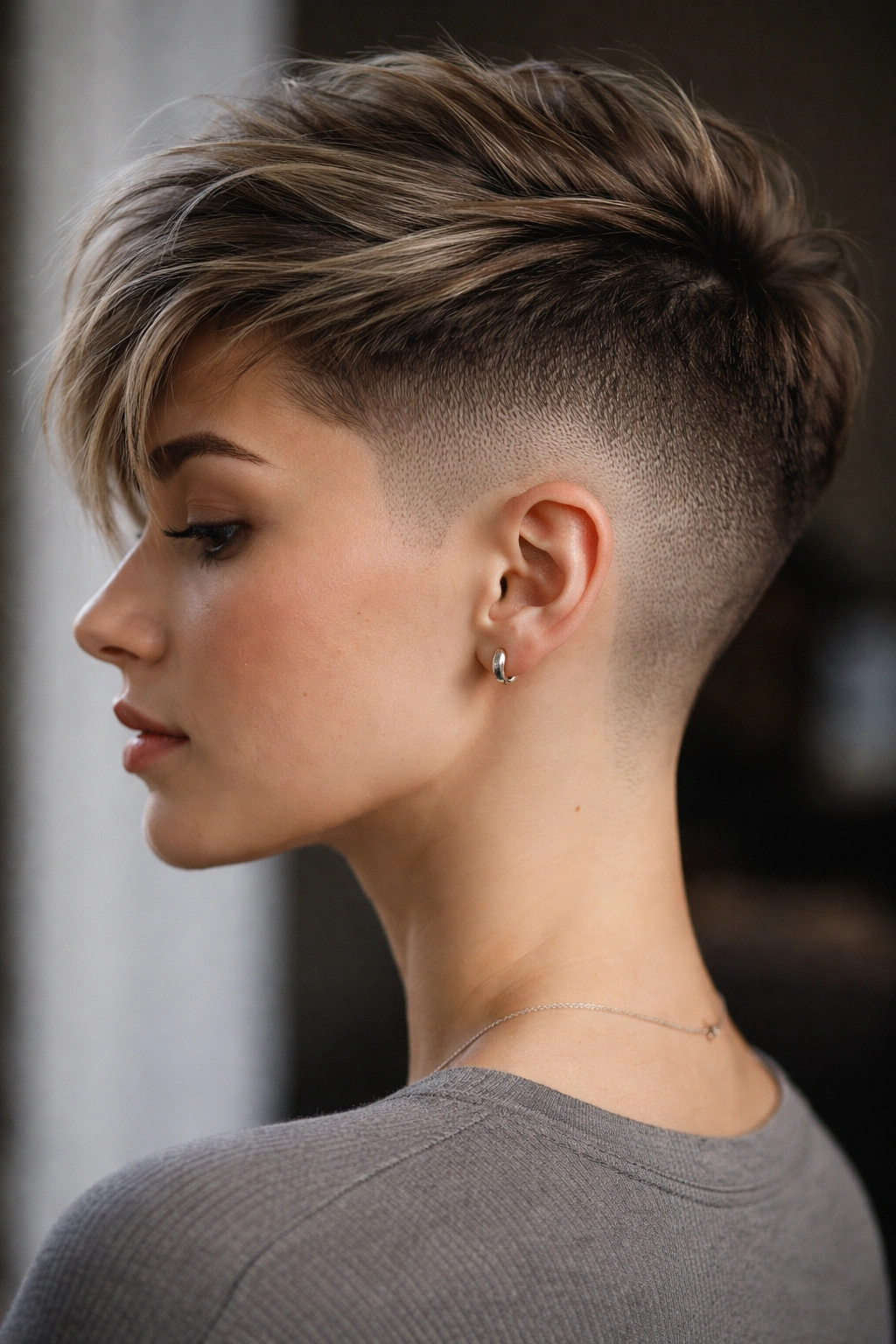 Stippled gradient fade pixie haircut with dot texture