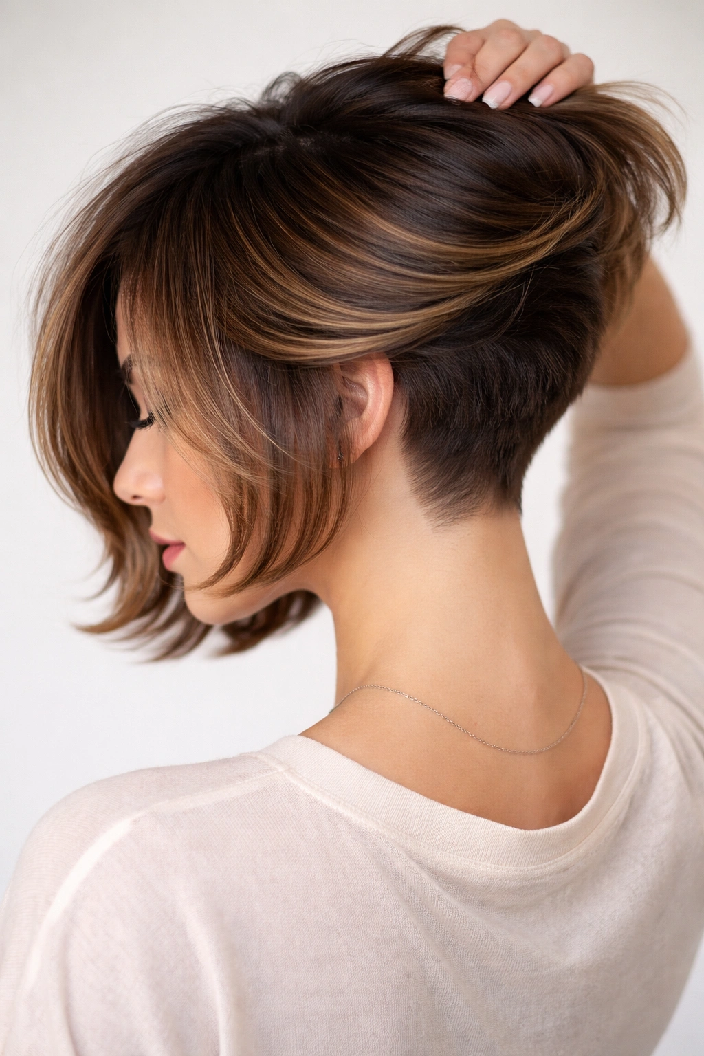 Undercut bob showing shorter underside beneath a fuller top.
